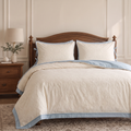 Ethereal Ivory Jacquard Bedding with Elegant Blue Border